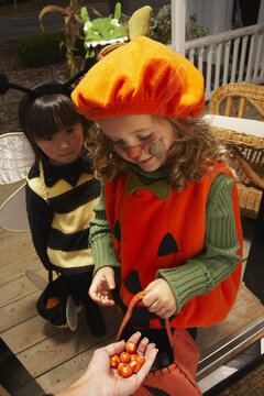 Children Trick or Treating at Halloween