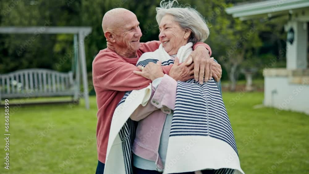 Sticker Nature, blanket and senior couple hugging, bonding and cuddle together in backyard garden. Happy, smile and elderly man and woman in retirement embracing with love, care and romance in outdoor park.