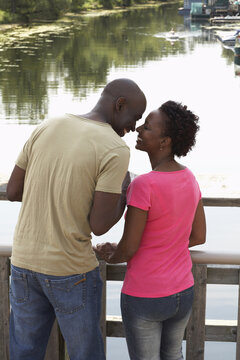 Couple Kissing by Pond