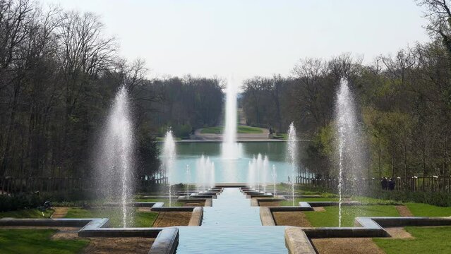 Grande Cascade in public Departemental Parc de Sceaux with Octogone Pool and Fountain in the background. Shot at early morning in March - Hauts-de-Seine, France.