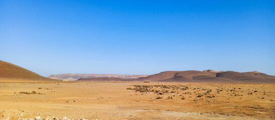 Beautiful natural view of moroccan desert landscape on sunny day with beautiful blue sky. Moroccan...