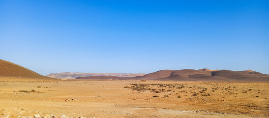 Beautiful natural view of moroccan desert landscape on sunny day with beautiful blue sky. Moroccan southern regions hills. © Original creations