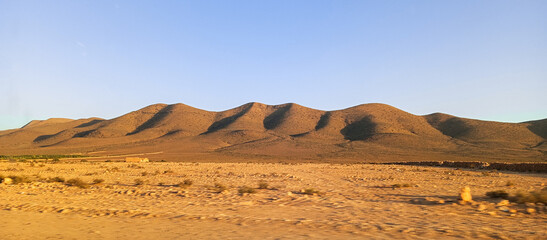 Beautiful panoramic view of natural landscape in moroccan southern desert. Brown hills in moroccan...