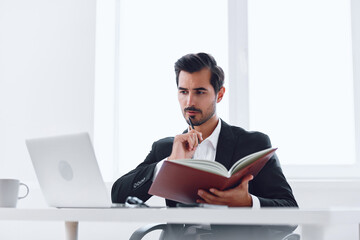 Stress man business thinking working laptop office desk looking tired sitting glasses angry