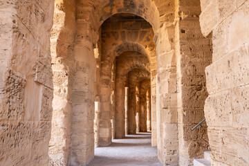 Interir of the amphitheater of the Roman ruins at El Jem. - obrazy, fototapety, plakaty