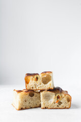 homemade olive focaccia on a white background, Flatlay of focaccia with green olive topping, fresh homemade focaccia bread