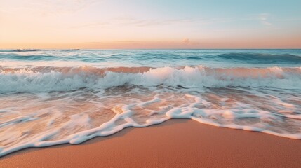 the beach at sunset with seawater splashing against the beach