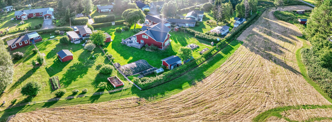 Scenic aerial photo of traditional summer cottages area at countryside, sunny summer day, very...
