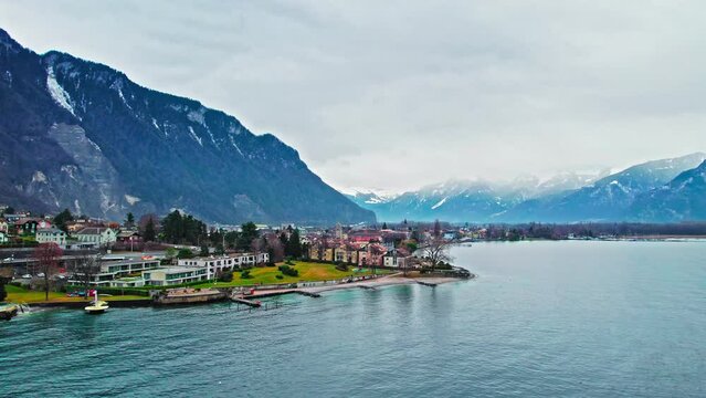 Aerial view of Geneva Lake and colourful houses in Switzerland. Panoramic view of a Lakeside in south of Veytaux in the canton of Vaud.