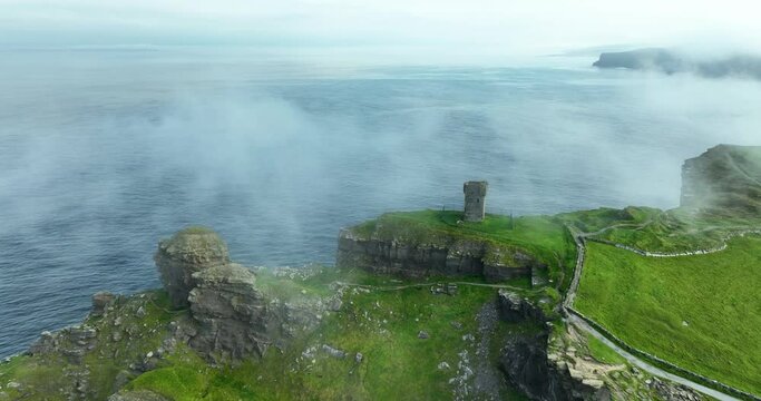 Misty Tower on the edge of the Cliffs of Moher 4k