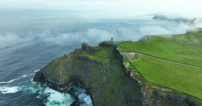 Misty Tower on the edge of the Cliffs of Moher in 4k