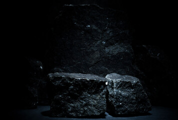 black stones for the podium on a dark background