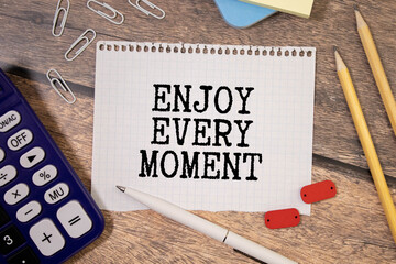 Conceptual handwriting showing Enjoy Every Moment. Business photo text being pleased with your life