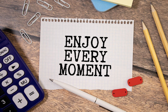Naklejki Conceptual handwriting showing Enjoy Every Moment. Business photo text being pleased with your life