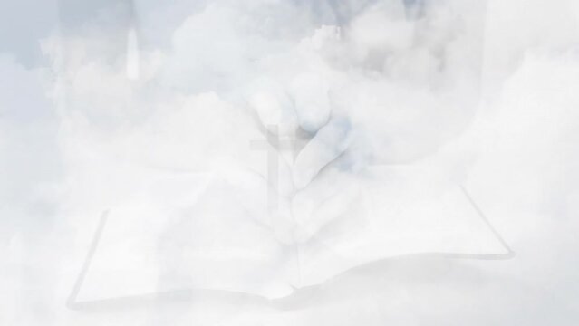 Animation of clouds over hands with book and cross