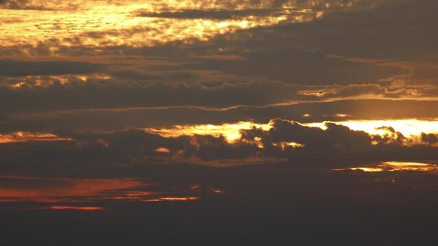 sunrise behind the cloud