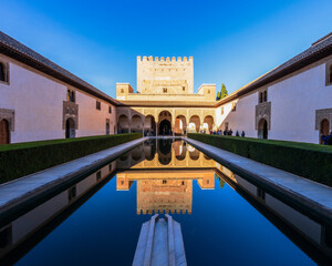 Court of the Myrtles in Alhambra. Alhambra is a Moorish Palace complex in Granada, Spain, a world...