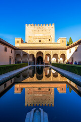 Fototapeta premium Court of the Myrtles in Alhambra. Alhambra is a Moorish Palace complex in Granada, Spain, a world heritage site