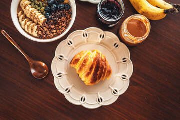 Smoothies, fruit with croissants and drinks