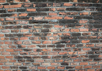 old brick wall with a lot of bricks.