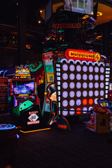 Naklejka premium Connect Four, Monopoly, Minecraft Dungeon games at Gameworks arcade in Seattle, WA