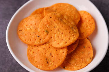 Thattai Nippattu Chekkalu south Indian deep fried snack made with rice flour prepared during Janmashtami or Sri Krishna Jayanthi festival