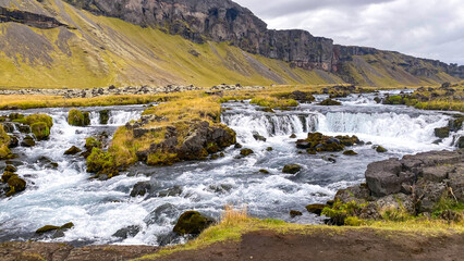 Small River Through Mountain Valley in Iceland