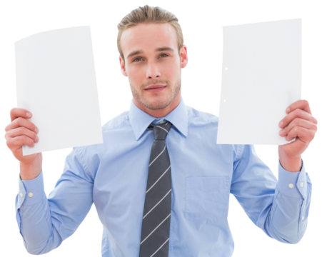 Digital png photo of happy caucasian businessman holding white cards on transparent background - Powered by Adobe