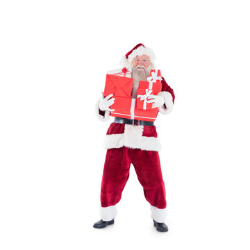 Digital png photo of happy santa with gifts on transparent background
