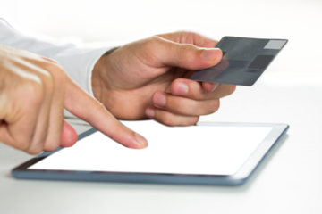 Digital png photo of hands of caucasian businessman using tablet on transparent background
