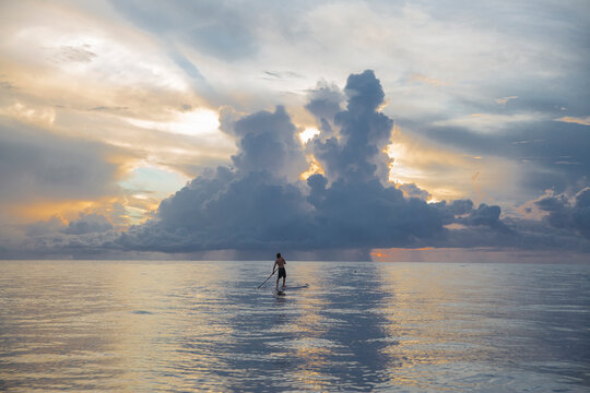 Paddle boarding in the sunset 