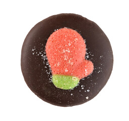 Dark chocolate Christmas candy in a red and green mitten on a round candy, isolated
