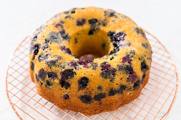 Lemon blueberry bundt cake with powdered sugar dusting