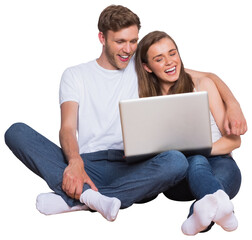 Digital png photo of happy caucasian couple using laptop, and laughing on transparent background