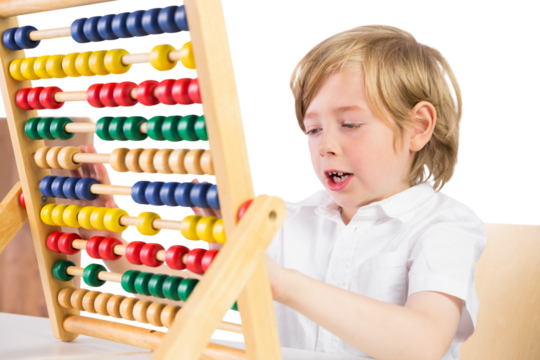 Digital png photo of focused caucasian boy using abacus on transparent background - Powered by Adobe