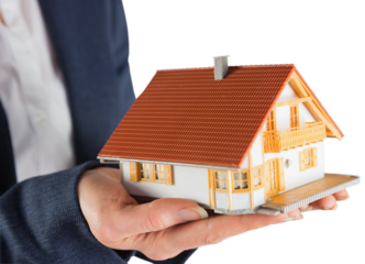 Digital png photo of house model held by woman's hands on transparent background
