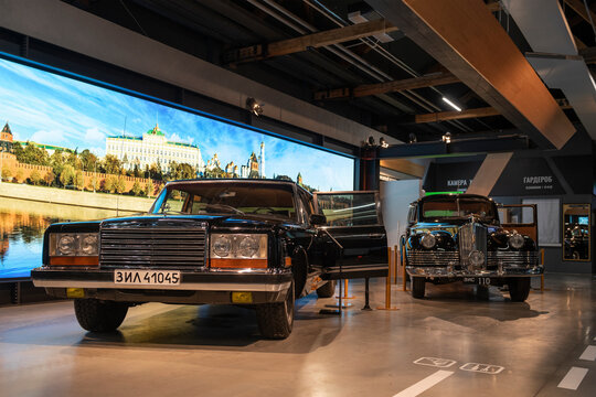 MOSCOW, RUSSIA - AUGUST 17, 2022: Two cars for the top government of the Soviet Union of the ZiS-110 and ZiL-41045 in the lobby of the Special Purpose Garage Museum, All-Russian Exhibition Center