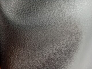 Close up The texture of the leather on the car seat with an elegant color gives an exclusive impression. 