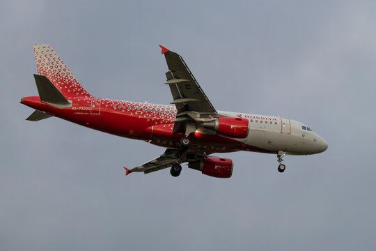 SAINT PETERSBURG, RUSSIA - OCTOBER 24, 2023: Aircraft Airbus A319-111 "Ivanovo" (RA-73222) of Rossiya airlines on the glide path in the gloomy sky