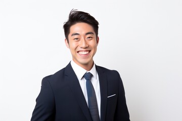微笑むビジネスマンのポートレート白背景