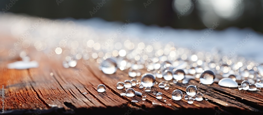 Sticker icy droplets on rustic cabin roof