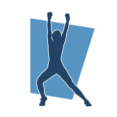 Silhouette of a slim female dance pose. Silhouette of a female in aerobic movement.