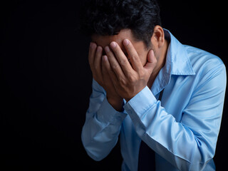 Businessman acted tired headache stressed and anxious from the frustrated business crisis,...
