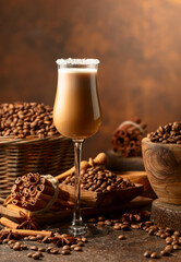 Irish cream and coffee liqueur on a brown background.