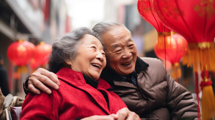 Fototapeta premium close up of joyful elderly chinese couple