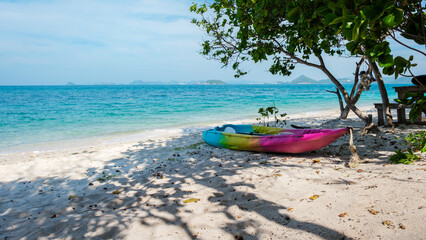 a kayak on the beach of Ko Kham Island Sattahip Chonburi Samaesan Thailand a tropical island with turqouse colored ocen - obrazy, fototapety, plakaty