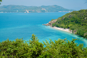 Viewpoint over Ko Kham Island Sattahip Chonburi Samaesan Thailand a tropical island with turqouse colored ocen, you can reach the viewpoint after a short hike in the jungle