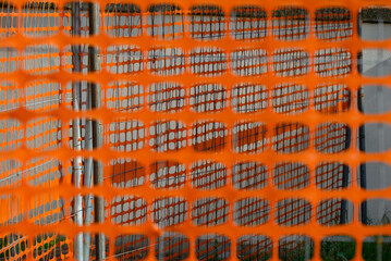 Orange fencing for repair work.