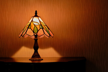 Stained glass lamp on the cabinet.