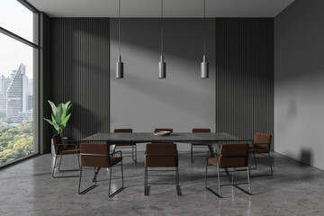 Gray dining room interior with long table